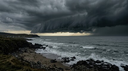 Fototapeta premium Dramatic coastal scene under a stormy sky with turbulent ocean waves.