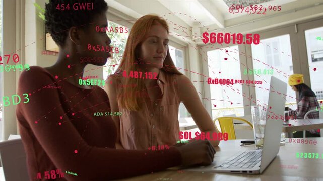 Left woman tapping pad coworker pair analyzing crypto prices, tickers highlighting values on laptop