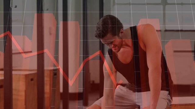 Man reaching for dumbbell starting seated biceps curls for strength while red chart tracking rep