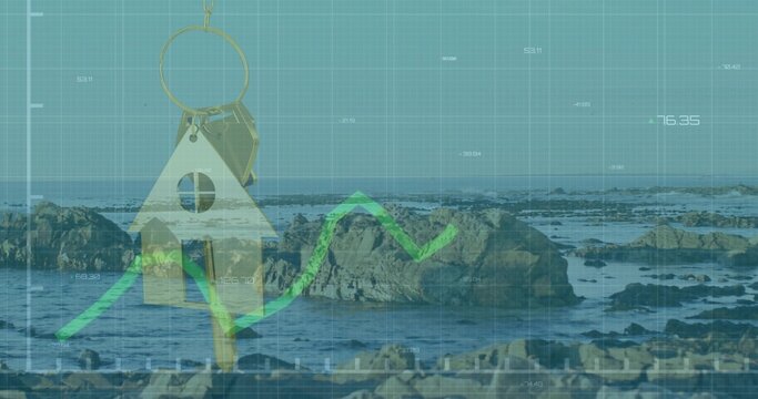 Hanging house keychain with keys floating over rocky low-tide coast, showing green trend overlay