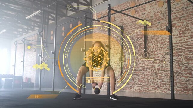 Set start, athlete swinging kettlebell hinging then driving hips high, HUD tracking for strength