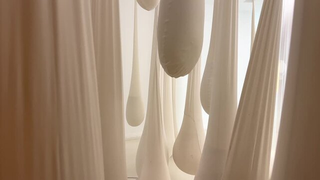 Art installation with white milk drops in cheese museum