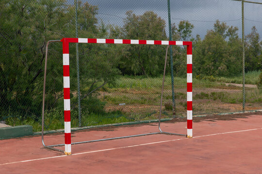 Red and White Soccer Goal for Youth Practice on Outdoor Field