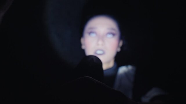 Terrifying Woman with White Eyes Appears in the Dark
