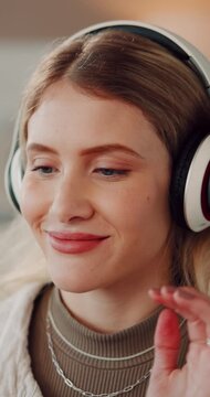 Headphones, thinking and woman in home, smile and listening to music, sound and radio. Apartment, relax and person in living room, streaming for audio and song with weekend break or podcast in Canada
