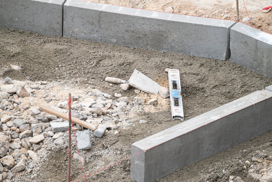 Construction tools for sidewalk building The Concept of precision