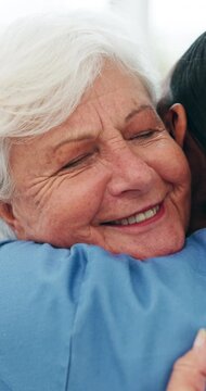 Hug, nurse and senior woman in home, smile and support for recovery, healing and healthcare. Apartment, medical service and old person in lounge, caregiver and embrace for empathy, help and gratitude