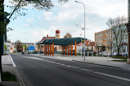 Prostejov, Czech Republic - April 18, 2026: Modern city bus stop with covered platform on empty urban street, ulice &Uacute;jezd