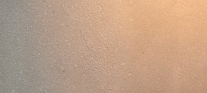 The yellow light hits the wall.