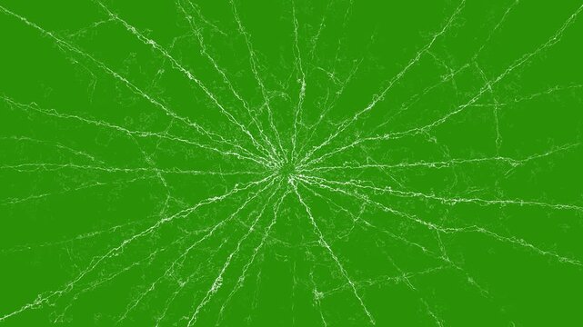 Cracked Screen Radial Impact Effect Overlay On Green Background. Glass Damage Effect, Fine White Fracture Lines Radiate From A Central Impact Point, Creating A Detailed Spiderweb Crack