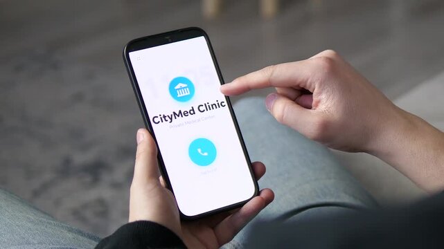 Sleek telehealth app in action. User calls a clinic and receives an instant automated appointment confirmation on screen. Perfect for e-health, medical software, and smart clinic marketing videos