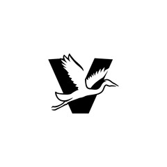 Fototapeta premium Flying stork with wide wings forming an alphabet letter V. Elegant bird logo for travel, delivery, or creative business branding.