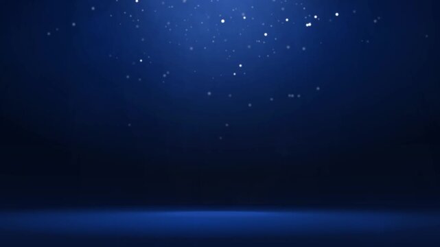 Dark blue studio background with flying lights and particles