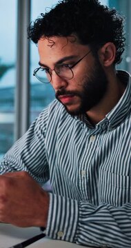 Man, texting and smartphone for communication in office, network and chat on social media and night. Working late, employee and person with mobile for schedule, app and message for contact on website