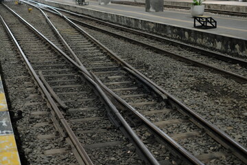 Fototapeta premium Railway track with switch and interchange on dark Lighting