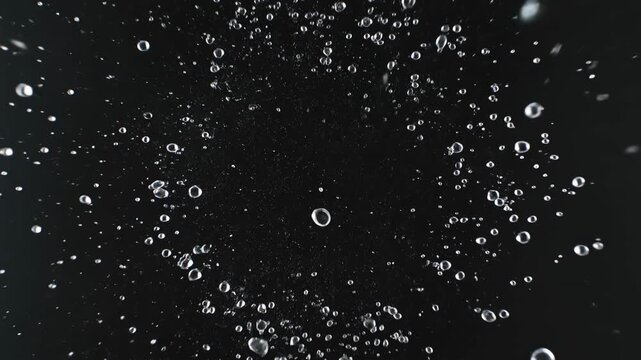 Dynamic background with water droplet particle convergence and explosion effects