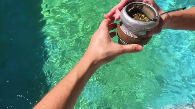 Authentic Argentine Mate Sharing Ritual by the Swimming Pool, Traditional Hot Drink