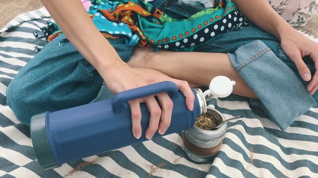 Traditional Argentine Beverage With Thermos and Mate Cup on the Beach, Sharing Latin American Ritual