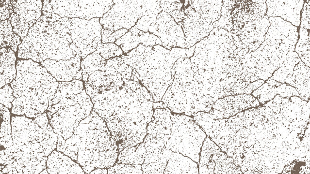 Cracked earth surface with dried mud and small holes and fissures all over