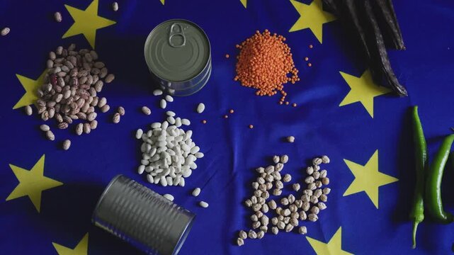 Legumes and Canned Foods on European Union Flag Representing Food Prices