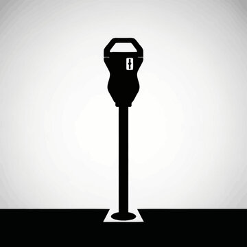 Silhouette of a parking meter on a street, representing urban infrastructure and time management.