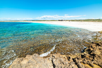 Obraz premium Is Arutas beach seen from rocks at one end of the shore