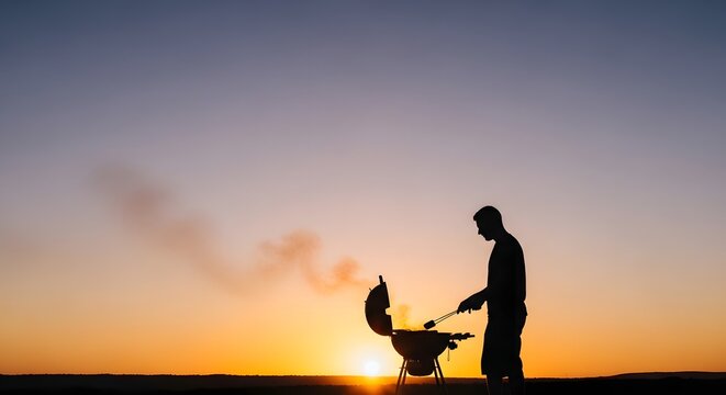Fathers day background silhouette of a dad grilling at sunset perfect for celebrations