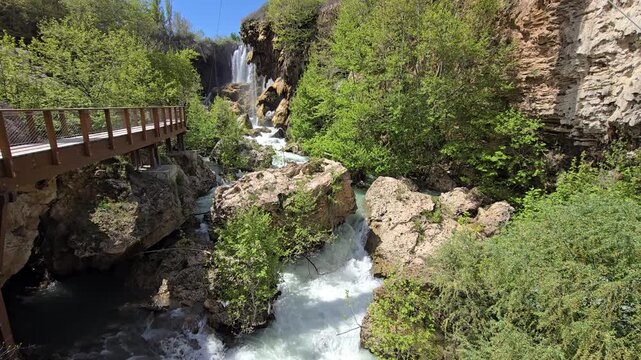 Experience the stunning cascades of Hadim Goksu Waterfall in Turkey. Lush greenery and flowing water create a peaceful getaway perfect for nature lovers and travelers seeking tranquility.