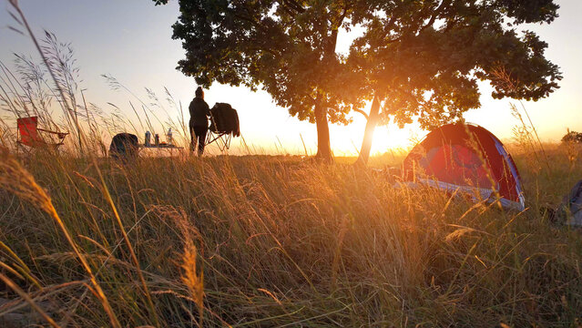 Camping in nature, enjoying outdoors in summertime.
