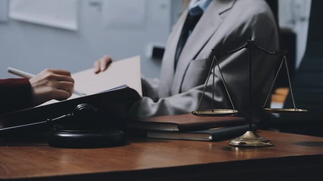 Lawyer explained to the client about the law that must be brought against the court case.