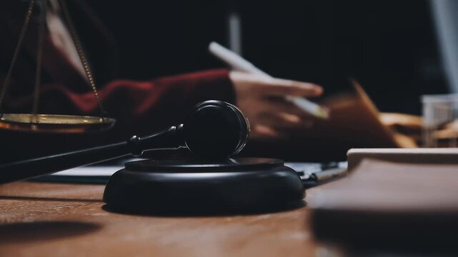 Lawyer explained to the client about the law that must be brought against the court case.