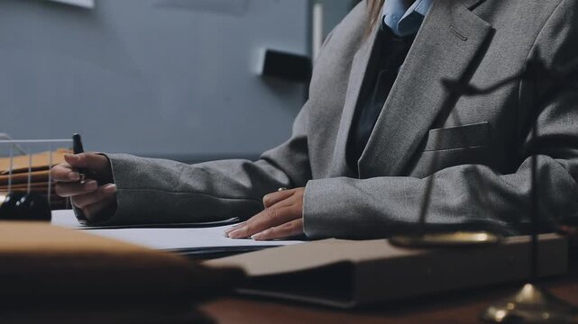 Lawyer explained to the client about the law that must be brought against the court case.