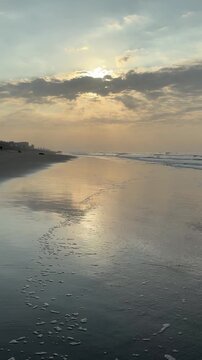 El Pared&oacute;n, Guatemala, is a serene black sand beach with crashing Pacific waves, palm trees, surfers, and breathtaking golden sunsets.