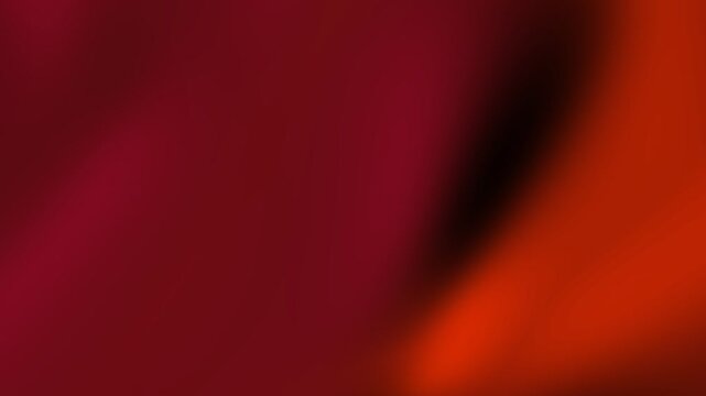Abstract blurred background in red and orange. Suitable for website banners, social media posts, digital art projects, and graphic design.