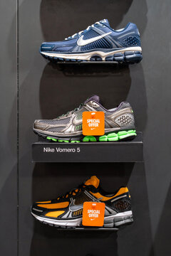 Nike sneakers on the shelf for sale in the shoe store in the shopping center. Nike shoes on display in shop. Sale of sports shoes. Minsk, Belarus - March 30, 2026