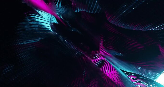 Vibrant, flowing digital forms pulse with neon hues loop