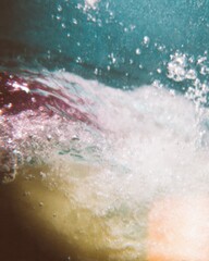 Fototapeta premium Deep teal viscous fluid swirls with coral rose highlights and air bubbles for artistic wallpaper, abstract book cover art and creative web background designs