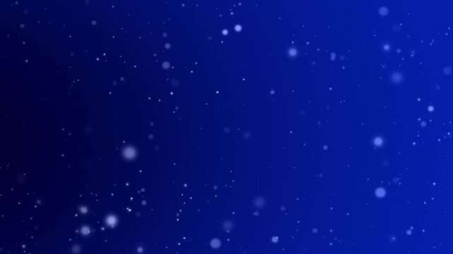青のグラデーション背景に、丸ボケが星のようにキラキラと輝く、パーティクルの光の背景アニメーション