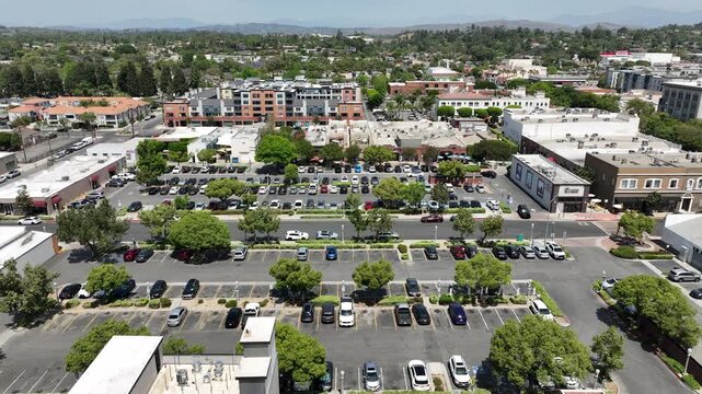 Fullerton, California, USA - Aerial View of Downtown Harbor Blvd Parking Lot Surrounded by Commercial Buildings, Restaurants and Bars