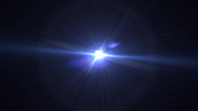 optical shine light lens flares animation on black background.