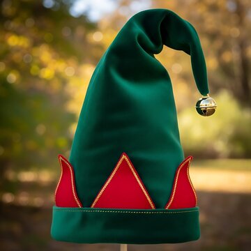 Deep green velvet elf hat with red & gold trim, topped with a jingling bell