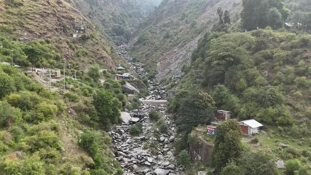 Drone View of Bhagsu Nag Waterfall and Rocky Himalayan Terrain