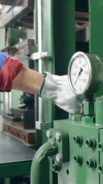 Industrial machine working dolly shot