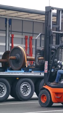 Industrial loading of wheelbase cargo with forklift on a truck