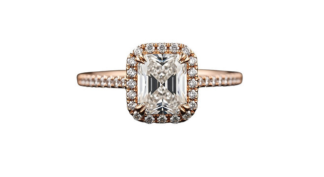 A close up view of a beautiful diamond ring with an ornate and detailed design.
