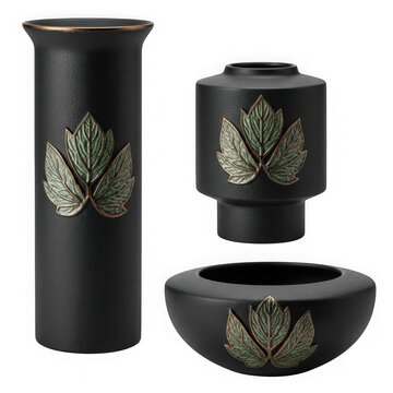 Three metal kitchen canisters with floral design on counter