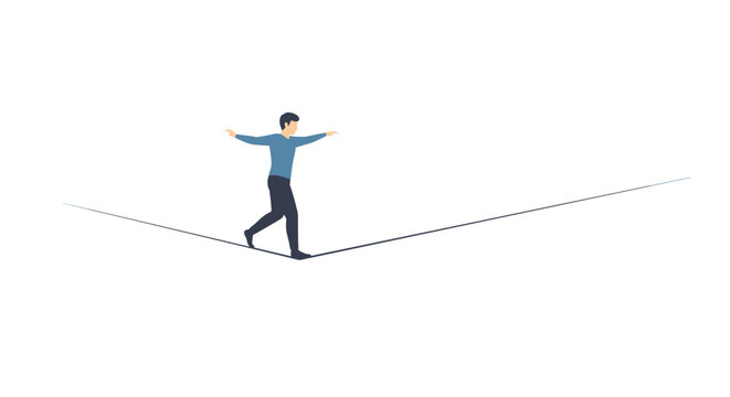 A man in a blue shirt balancing on a tightrope in the dark