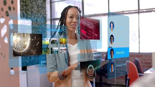 Vertical video: Woman tapping tablet opening tech panels scrolling grid picking contacts for demo