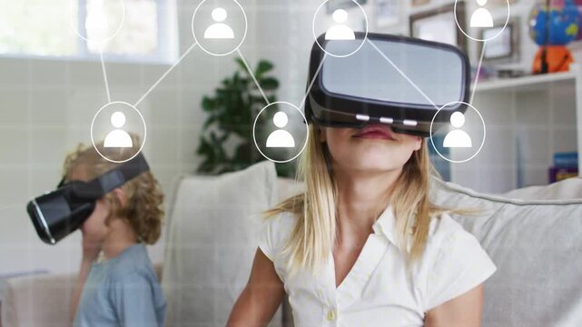 Girl wearing VR headset reaching nodes on couch, with network overlay growing then fading, playing