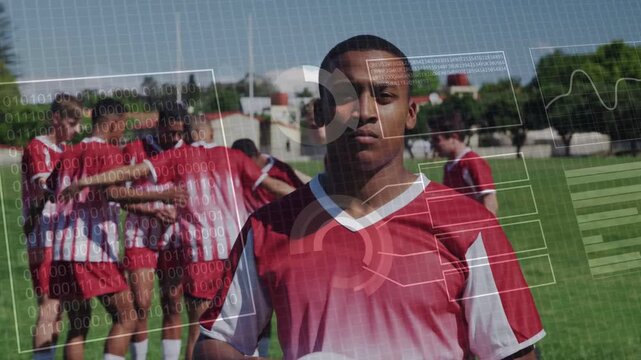 Teen male adjusting flipping oval ball on sports field as team huddling, HUD overlays crossing him